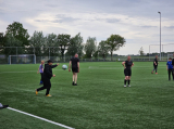 Laatste training S.K.N.W.K. JO11-1JM (partijtje tegen de ouders) van maandag 27 mei 2024 (14/137)